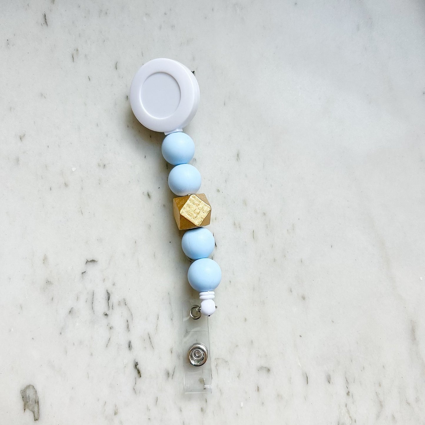 Solid Group: Light Blue Badge Reel