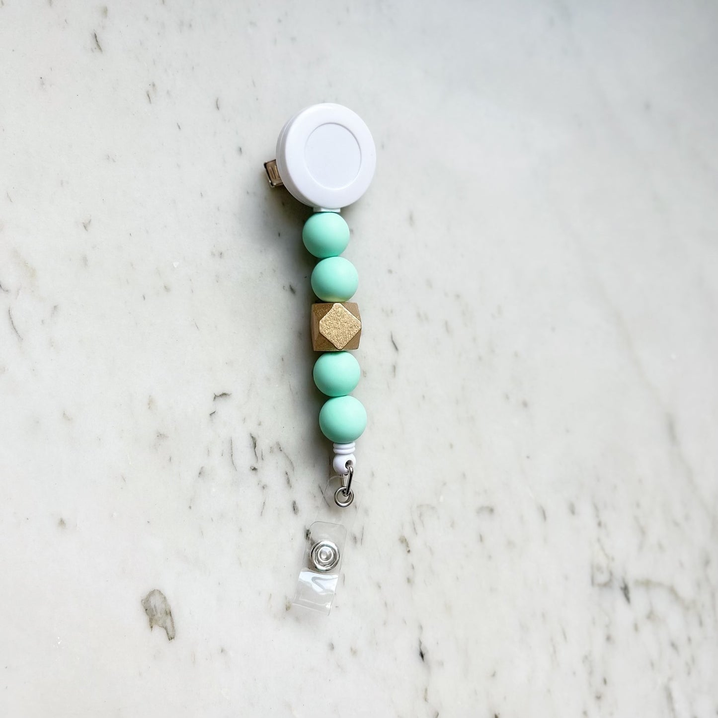 Solid Group: Mint Badge Reel